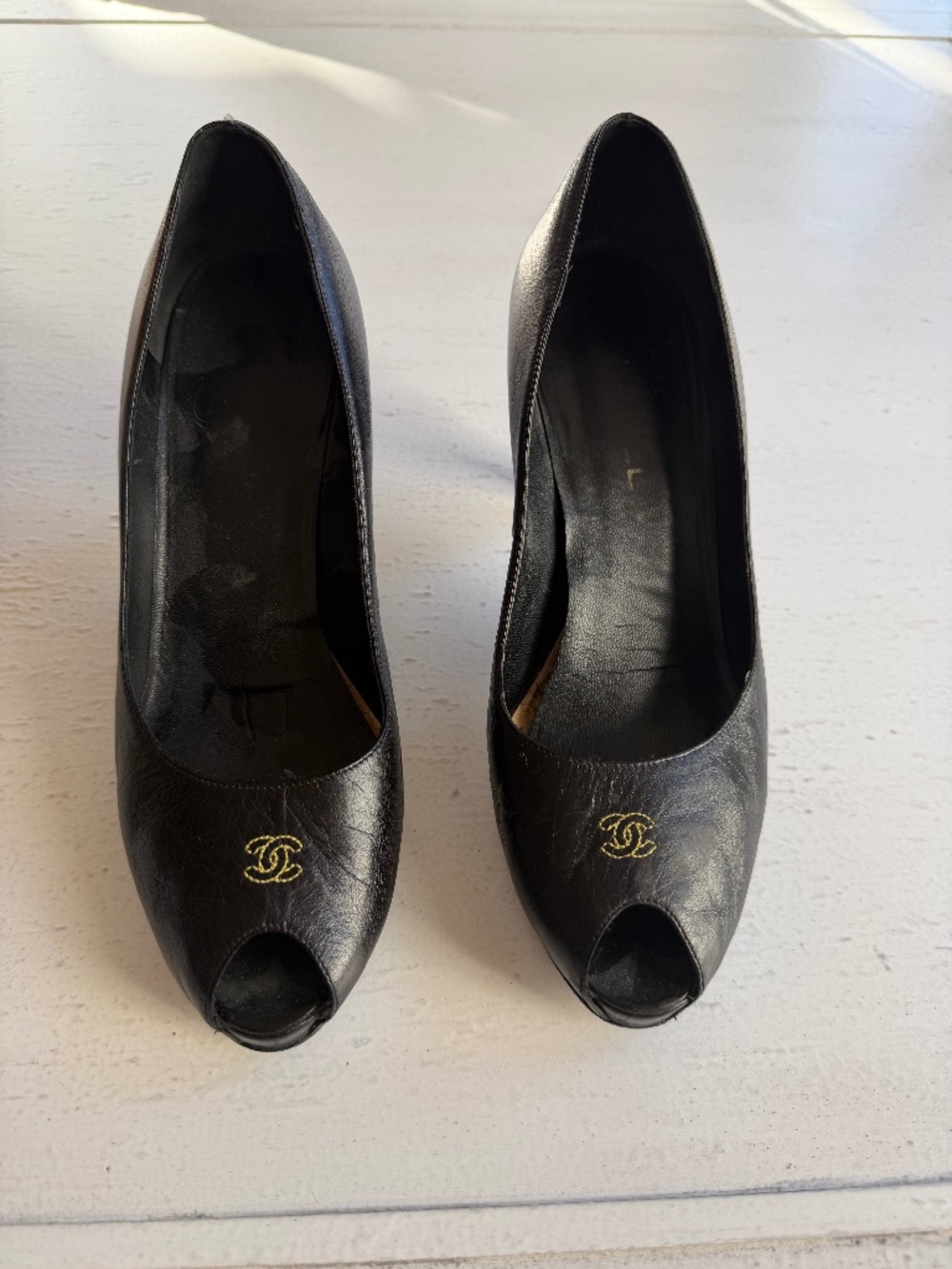 Chanel black leather peep-toe platform pumps
